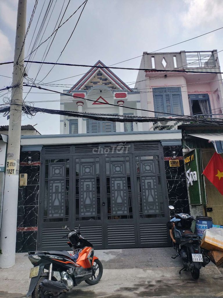 Nhà 1 lầu,mặt tiền nhựa xuânThớiSơn 19 ,tiện buôn bán.