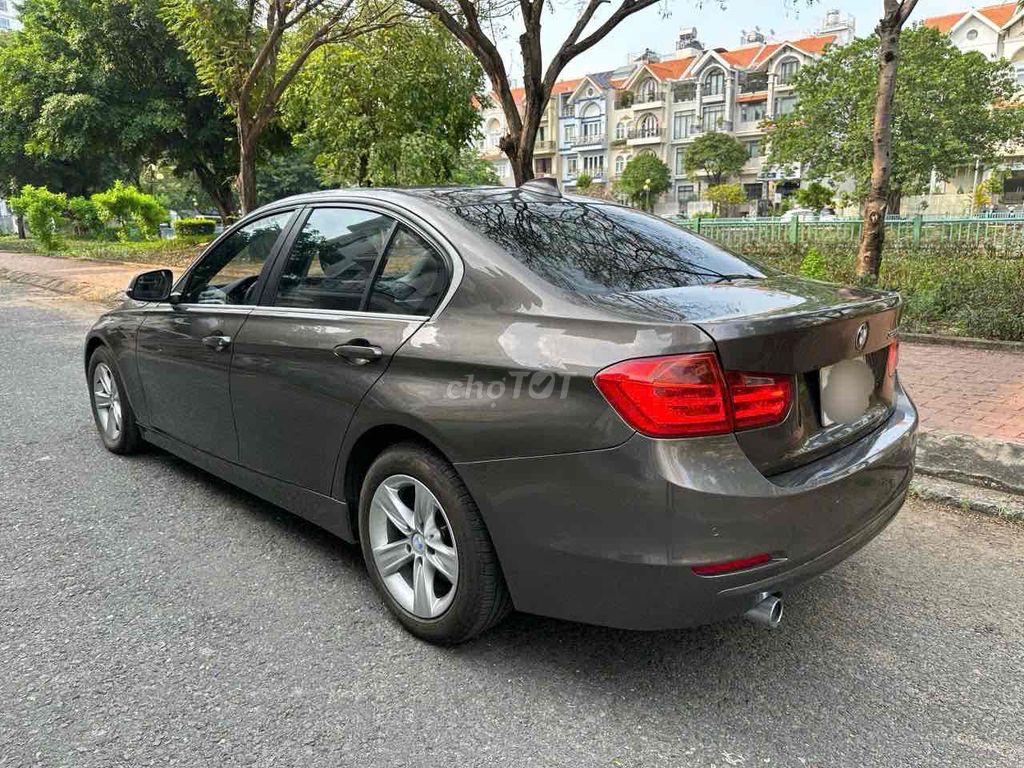 BMW 320i 2014 Nâu/Đen 69000km. Mua bán Ô tô tại Quận 7 Tp Hồ Chí Minh được đăng bởi auto thanh tâm  hình 3