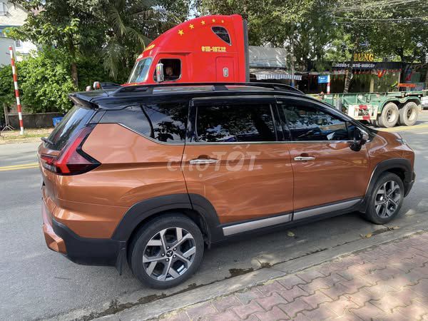 Mitsu Xpander Cross màu cam vũ trụ đời 2023. Mua bán Ô tô tại Thành phố Dĩ An Bình Dương được đăng bởi Lâm Thái hình 2