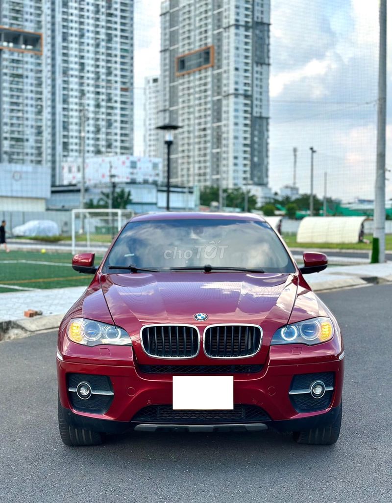 BMW X6 2011 Đỏ 87000 km. Mua bán Ô tô tại Quận 12 Tp Hồ Chí Minh được đăng bởi Xuân Trường hình 1