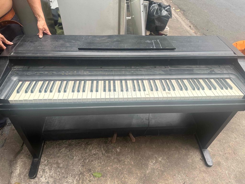 đàn piano casio như hình ko vô nguồn bán