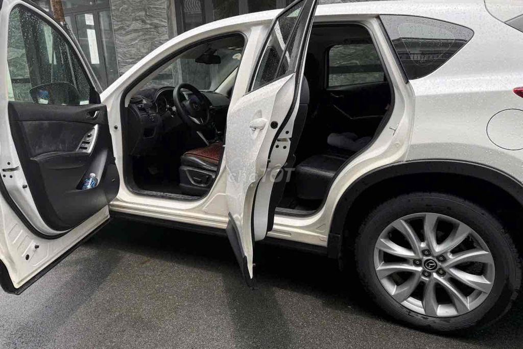 Mazda CX-5 2.0 AT 2014 белая 92000 км
