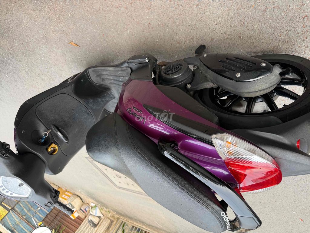 Piaggio Liberty 2011 màu Tím. Mua bán Xe máy tại Huyện Hóc Môn Tp Hồ Chí Minh được đăng bởi Hoàng Anh Tuấn hình 5