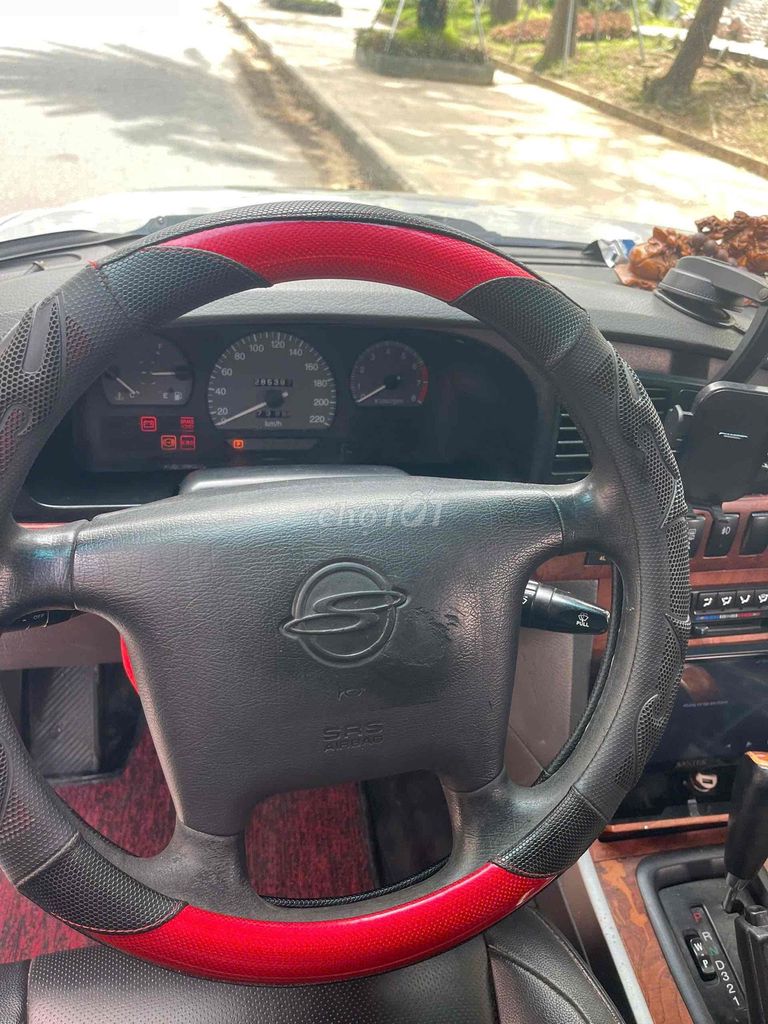 SsangYong Musso 2004 Trắng Tự động