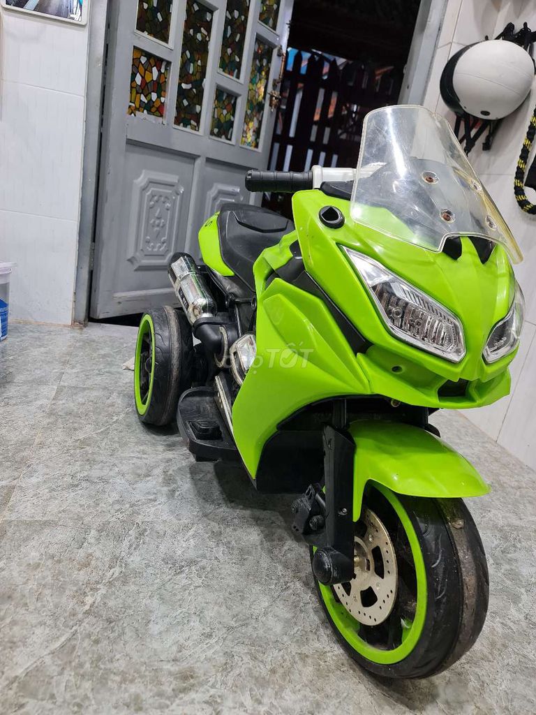Xe máy điện trẻ em Xanh lá nhựa. Mua bán Mẹ và bé tại Thành phố Thủ Đức Tp Hồ Chí Minh được đăng bởi trần quang tú hình 1