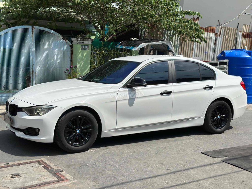 BMW 3 Series 2013 320i - 86000 km. Mua bán Ô tô tại Quận 7 Tp Hồ Chí Minh được đăng bởi Thông Sport  hình 2