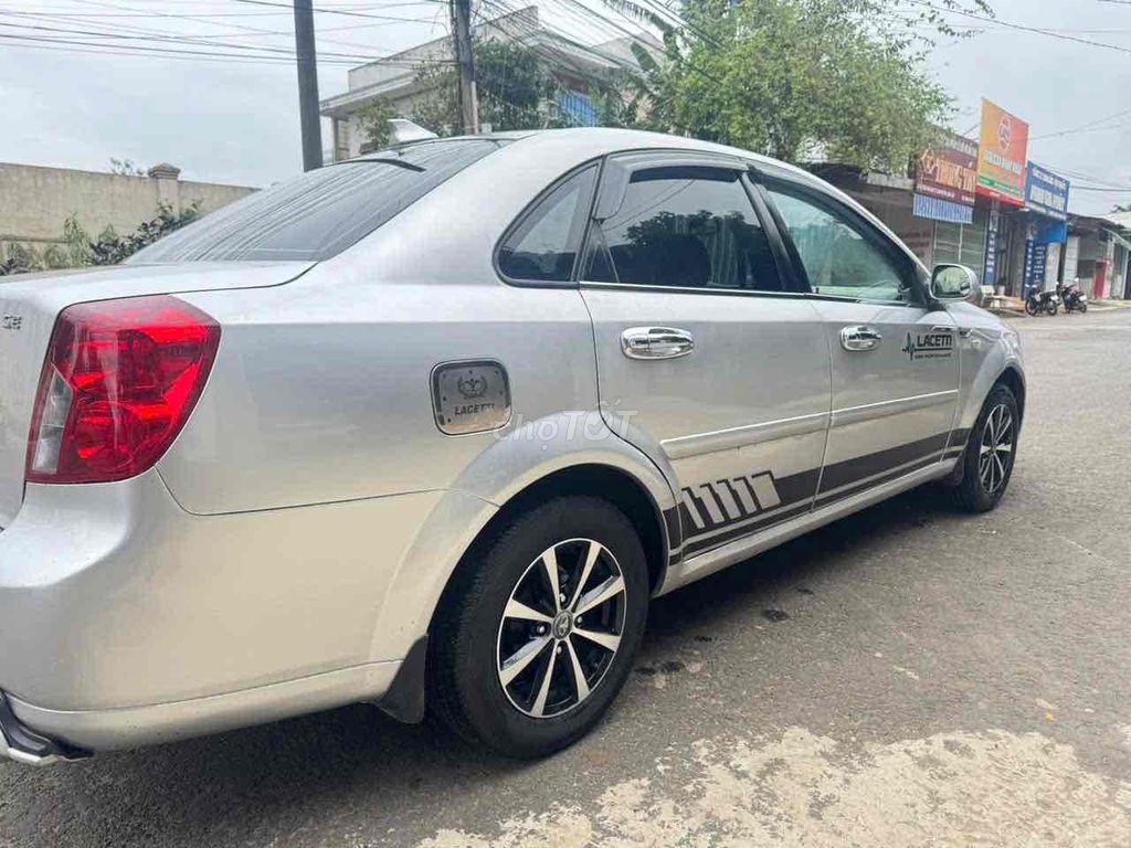 Daewoo Lacetti Số sàn 5 chỗ Bạc. Mua bán Ô tô tại Huyện Ea Kar Đắk Lắk được đăng bởi an khang hình 13