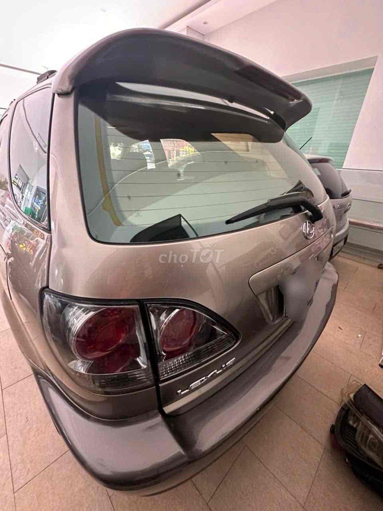 Lexus RX 300 Vàng cát 5 chỗ. Mua bán Ô tô tại Thành phố Biên Hòa Đồng Nai được đăng bởi Tran Hieu Car hình 2