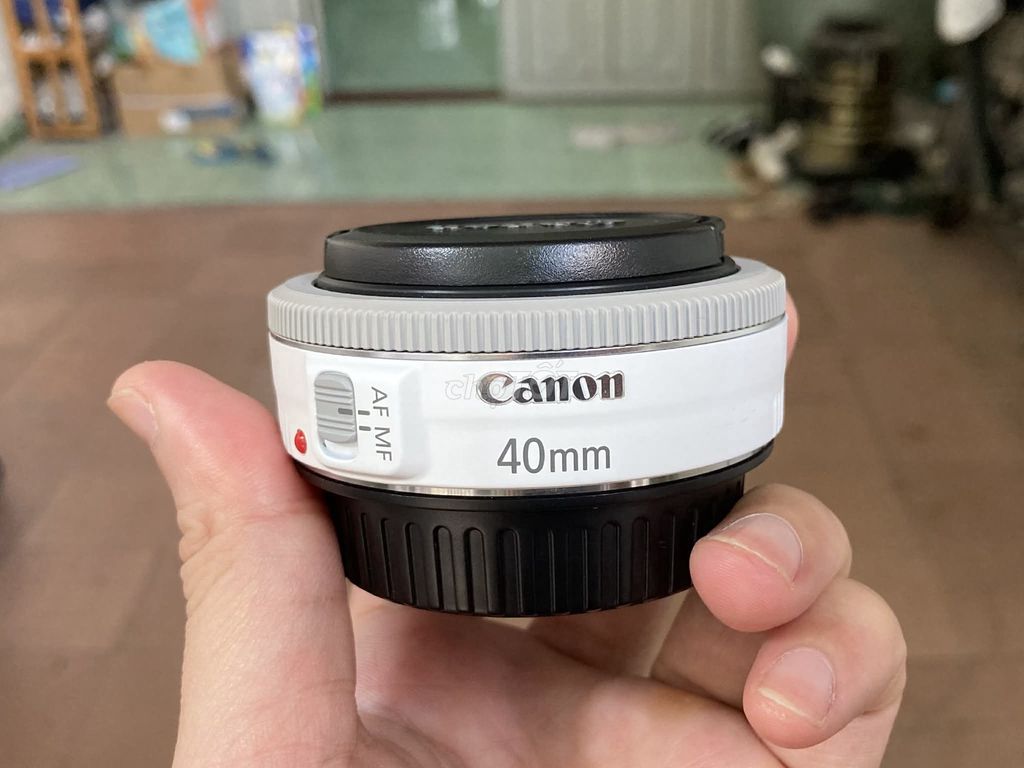 Ống kính Canon EF 40mm F/2.8 STM màu Trắng. Mua bán Máy ảnh, Máy quay tại Quận 12 Tp Hồ Chí Minh được đăng bởi Samstag hình 1