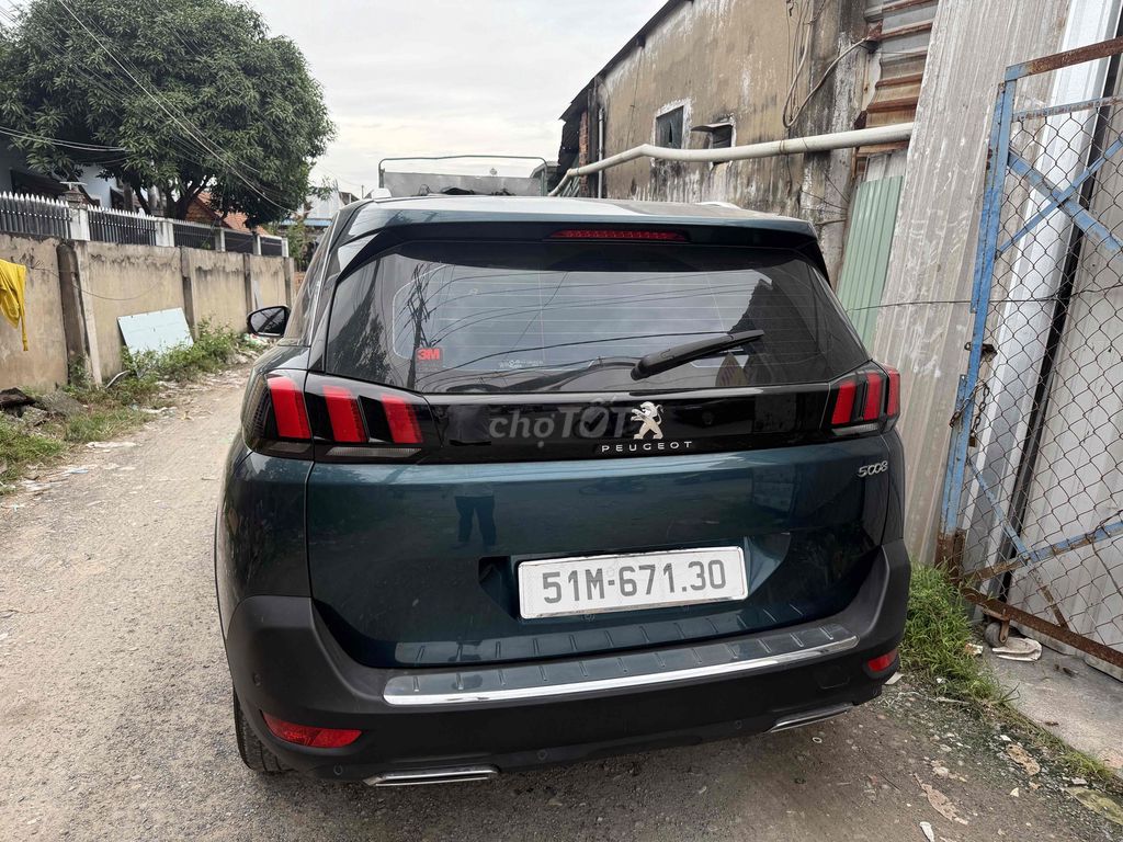 Peugeot 5008 Xanh rêu 92897 km. Mua bán Ô tô tại Thành phố Thuận An Bình Dương được đăng bởi Trần Chầm hình 3