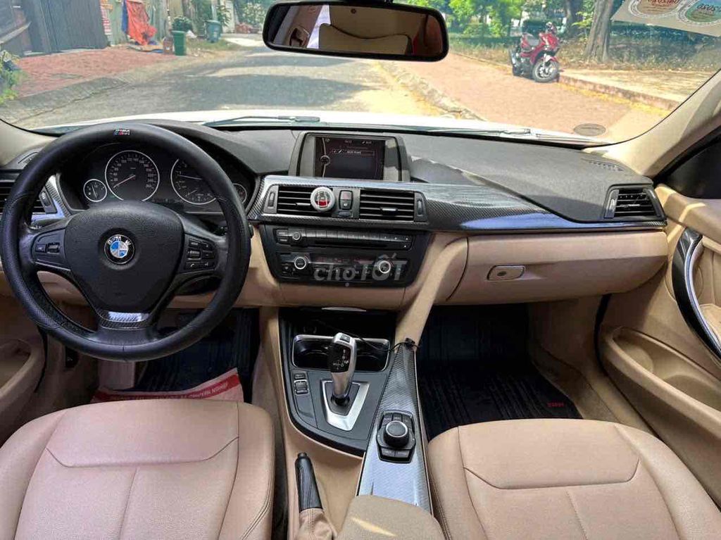 BMW 320i sx 2014 Trắng 72000 km. Mua bán Ô tô tại Quận 7 Tp Hồ Chí Minh được đăng bởi auto thanh tâm  hình 9