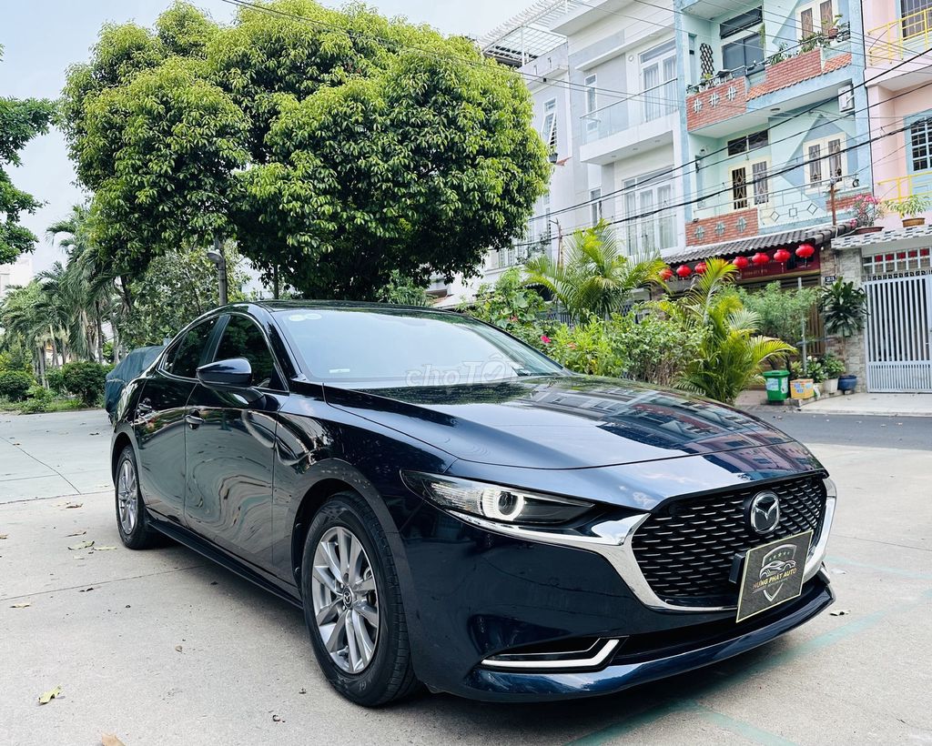 Mazda 3 1.5L Premium рег. 2023 сине-черный, полная комплектация