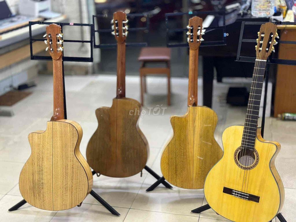 đàn guitar xả kho mới 100%