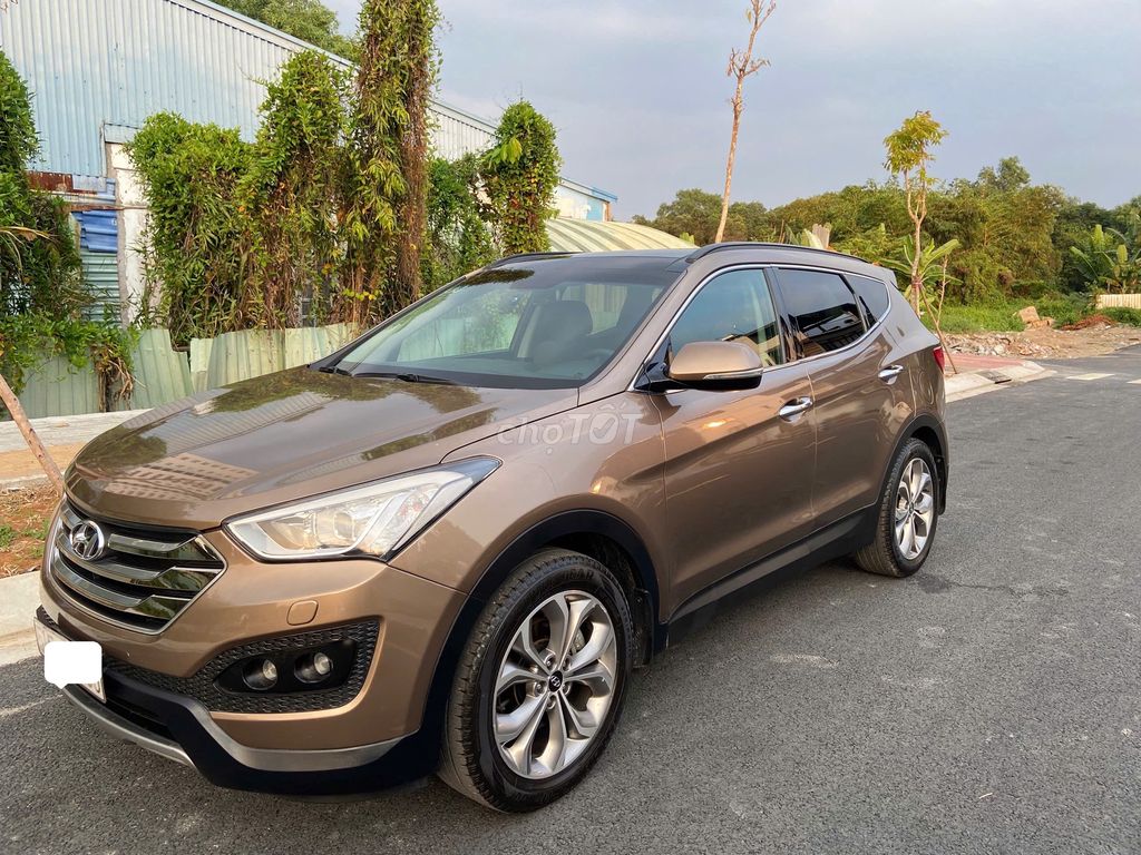 Santa Fe 2.4L 4WD ghi vàng 2014