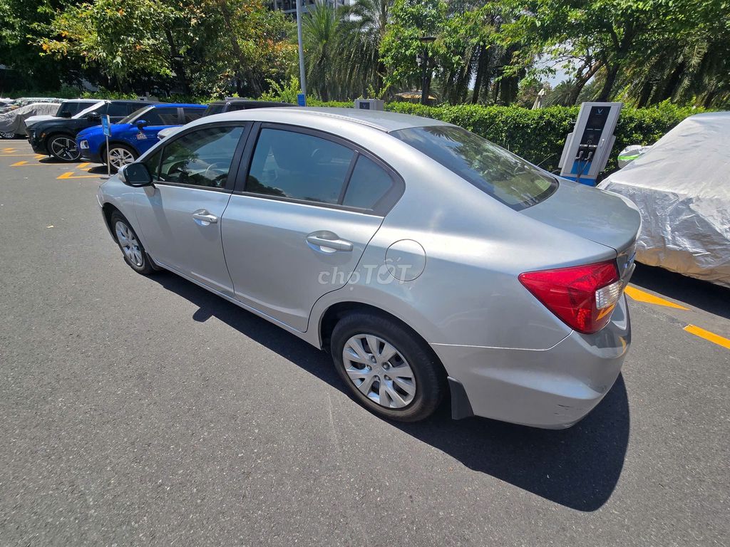 Серебряный номер Honda Civic 2014 года 145 000 км