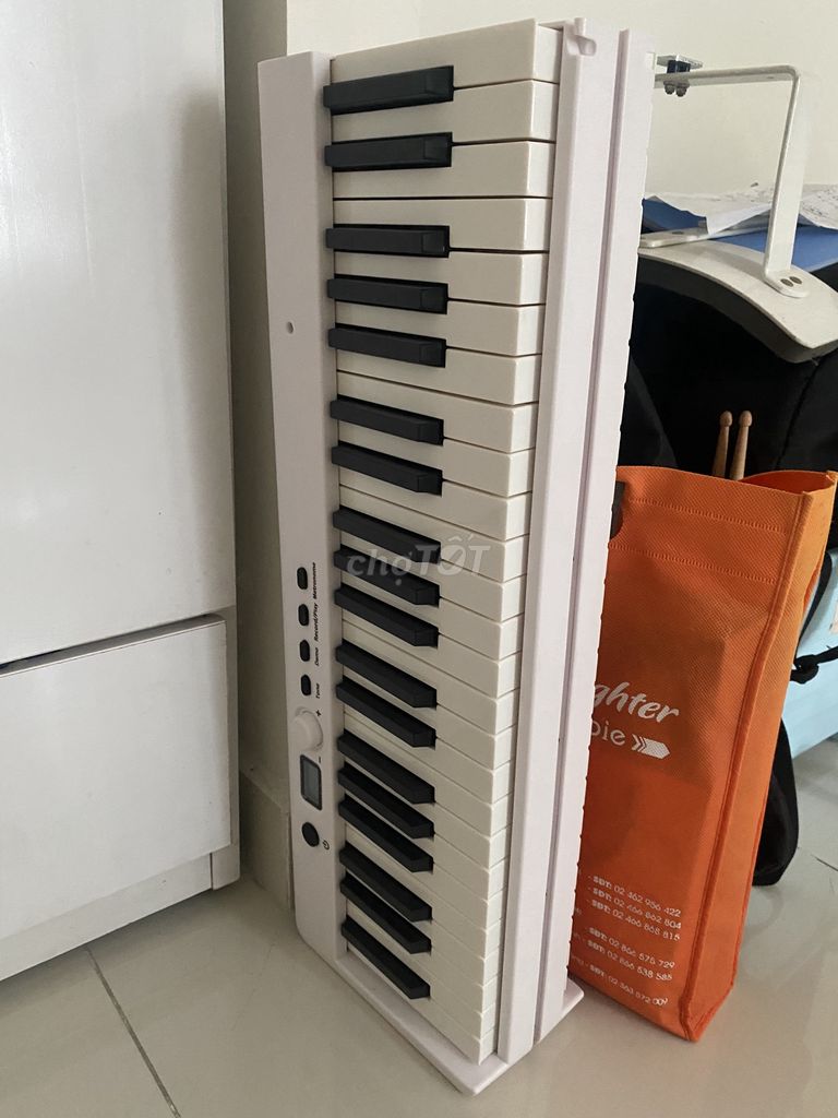 Piano điện BX 20 Trắng 88 phím gấp gọn còn mới