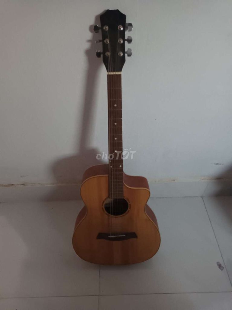 Đàn guitar gỗ màu nâu. Mua bán Nhạc cụ tại Thành phố Phan Rang-Tháp Chàm Ninh Thuận được đăng bởi Anh Khoa hình 1