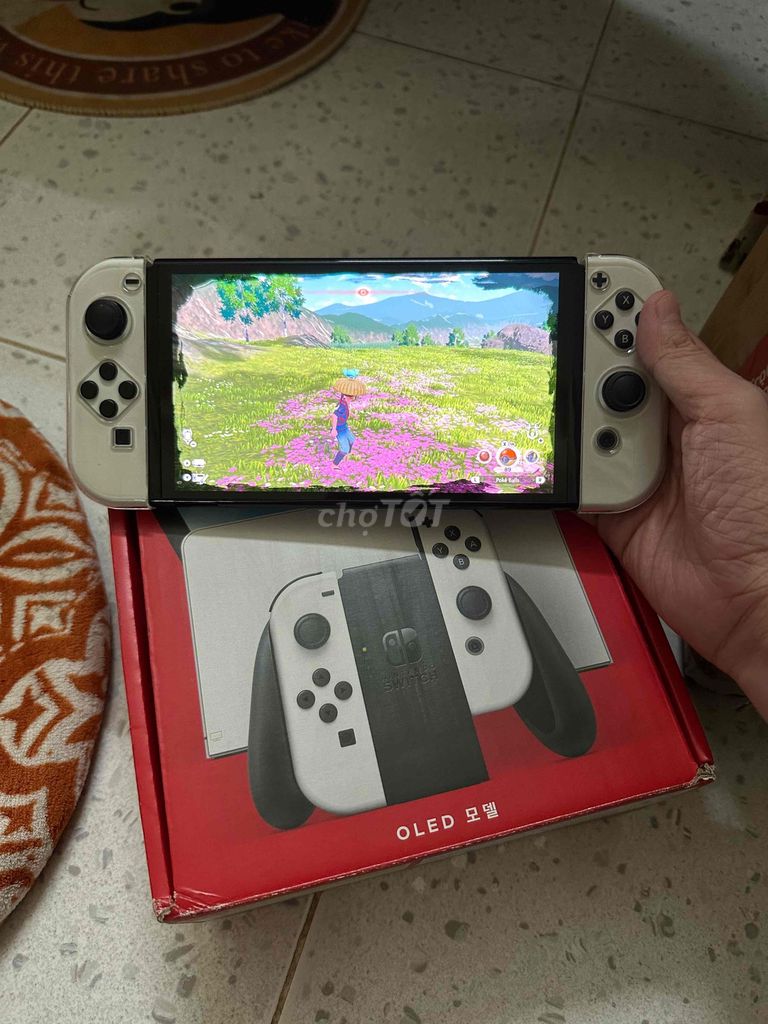 Nintendo Switch OLED Trắng Fullbox Nguyên bản. Mua bán Thiết bị chơi game tại Quận 4 Tp Hồ Chí Minh được đăng bởi Phạm Duy Luân hình 1