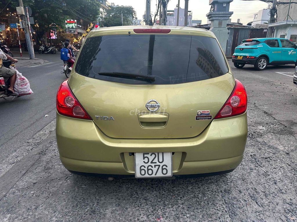 Nissan Tiida Vàng đồng 5 chỗ Số tự động. Mua bán Ô tô tại Quận Tân Phú Tp Hồ Chí Minh được đăng bởi Bảo Lam hình 4