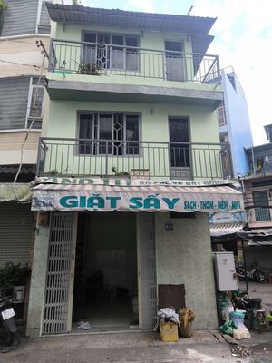 Nhà mặt tiền , ngay góc chợ , dễ buôn bán , ngay cầu tân thuận 2