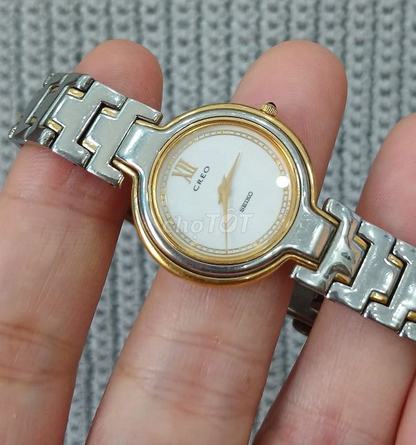 Đồng hồ Nữ Seiko Creo đờ mi vàng, mặt tròn