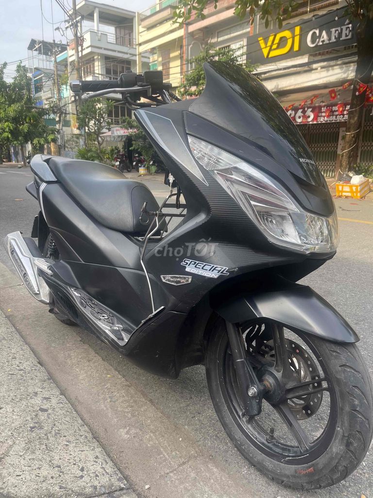 Honda PCX 2014 Đen 70000 km. Mua bán Xe máy tại Quận 8 Tp Hồ Chí Minh được đăng bởi hoành tử ếch hình 2