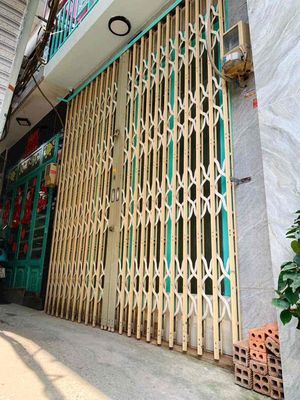 Tôi bán nhà 30 m2, 1 trệt.1 lầu đúc, 2 WC, tuyệt đẹp, Quận 7