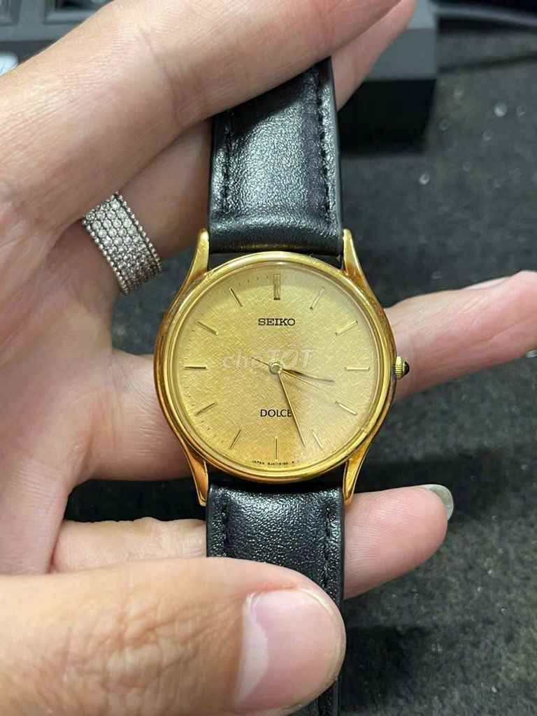 Seiko Dolge máy pin, bọc vàng, núm đá xanh