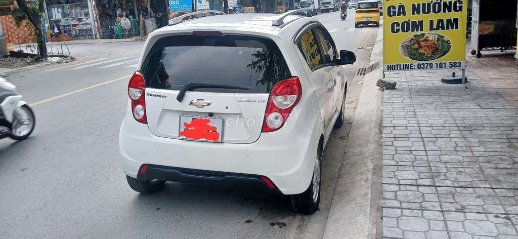 Chevrolet Spark 2015 LTZ. Zest  Trắng số tự động. Mua bán Ô tô tại Quận 12 Tp Hồ Chí Minh được đăng bởi Gia Han  hình 2