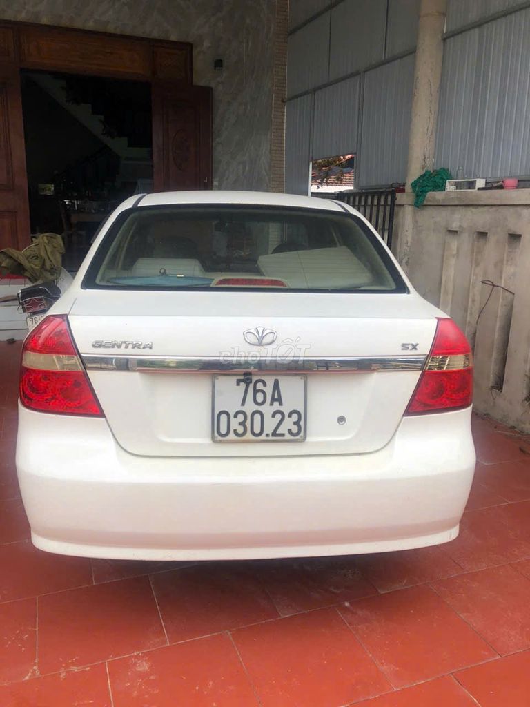 Daewoo Gentra 2010 SX Trắng. Mua bán Ô tô tại Huyện Bình Sơn Quảng Ngãi được đăng bởi Võ Hoài Chung hình 2