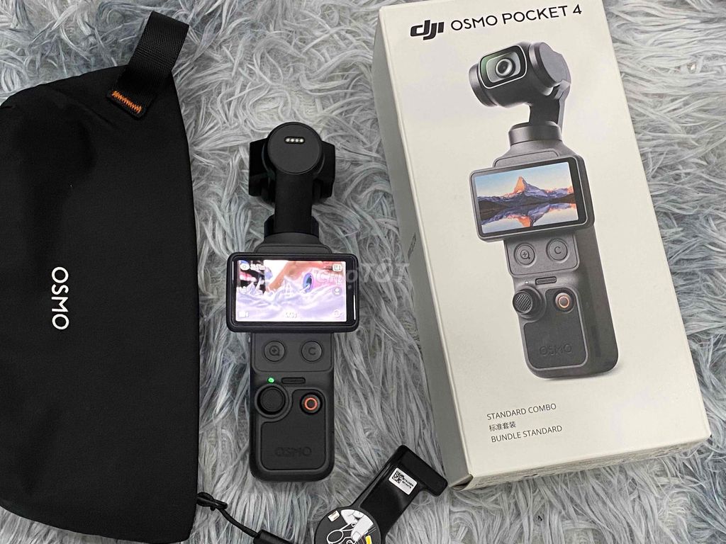 Máy quay DJI Osmo Pocket 4 Đen đã sử dụng. Mua bán Máy ảnh, Máy quay tại Quận 5 Tp Hồ Chí Minh được đăng bởi Thư Chuyên Hàng Điện Tử hình 1