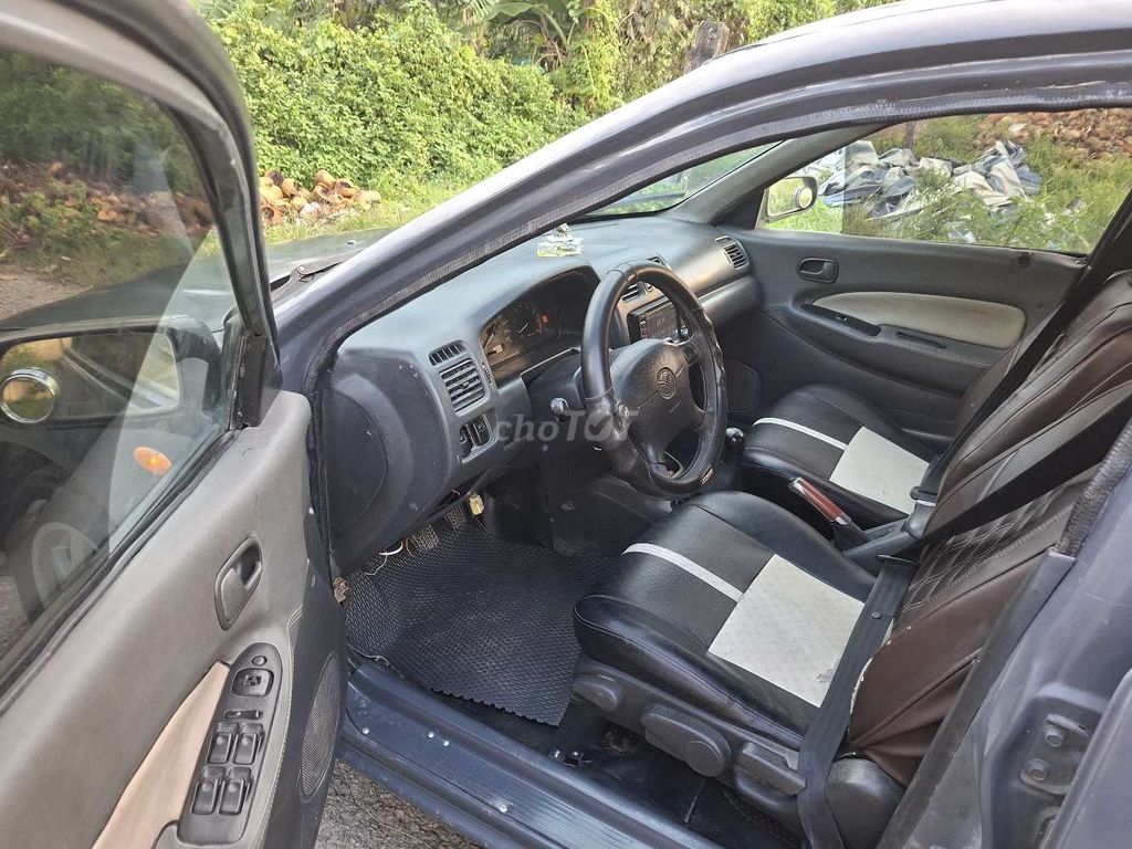 Mazda 323 1999 Xám Số sàn. Mua bán Ô tô tại Huyện Hóc Môn Tp Hồ Chí Minh được đăng bởi Nguyễn văn thắng hình 4