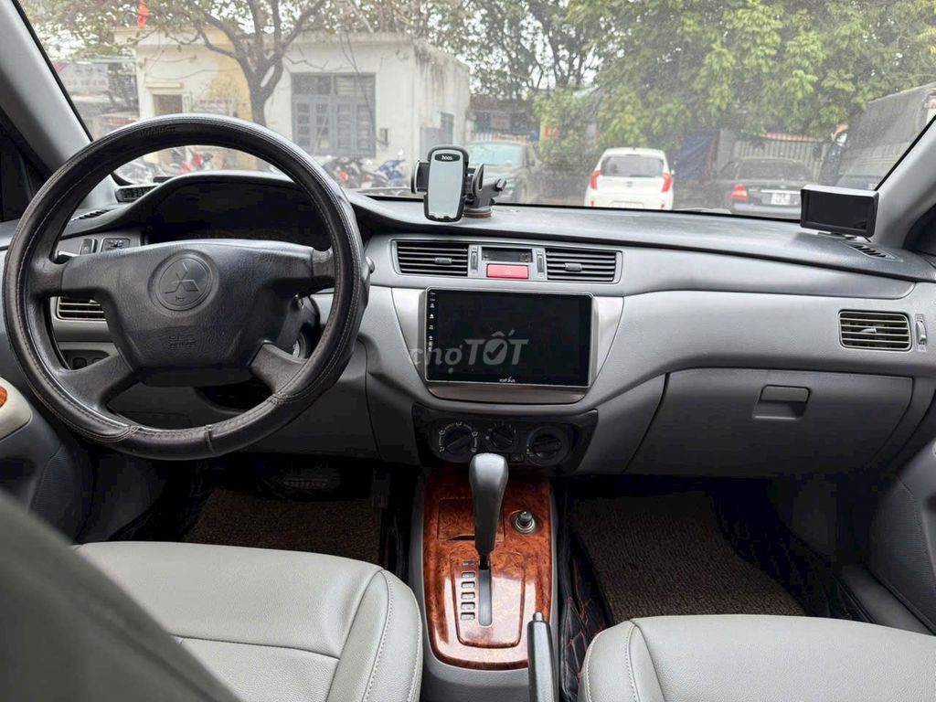 Mitsubishi Lancer 2003 1.6 AT - 250000 km. Mua bán Ô tô tại Quận Nam Từ Liêm Hà Nội được đăng bởi Linh Nguyen hình 6