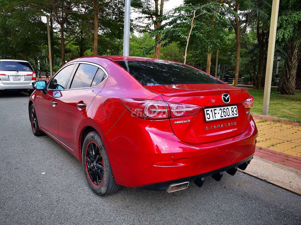 Mazda 3 đỏ pha lê 1.5 AT Sedan - 90000 km