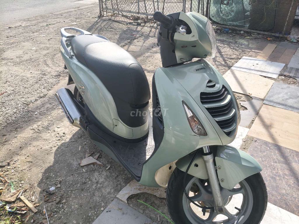 Мопед Honda PS 2009 зеленого цвета
