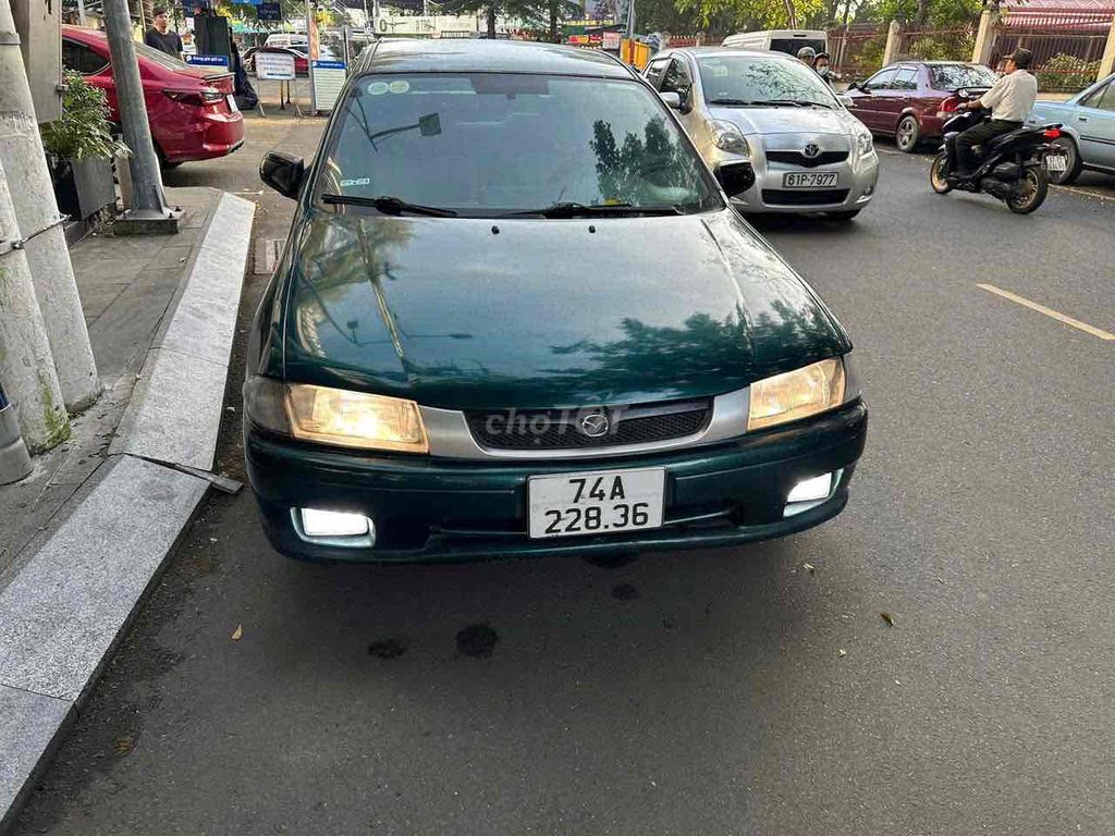 Mazda 323 2000 GLX 1.6MT - 252211 km. Mua bán Ô tô tại Thành phố Thủ Dầu Một Bình Dương được đăng bởi Ô TÔ CŨ BÌNH DƯƠNG hình 1