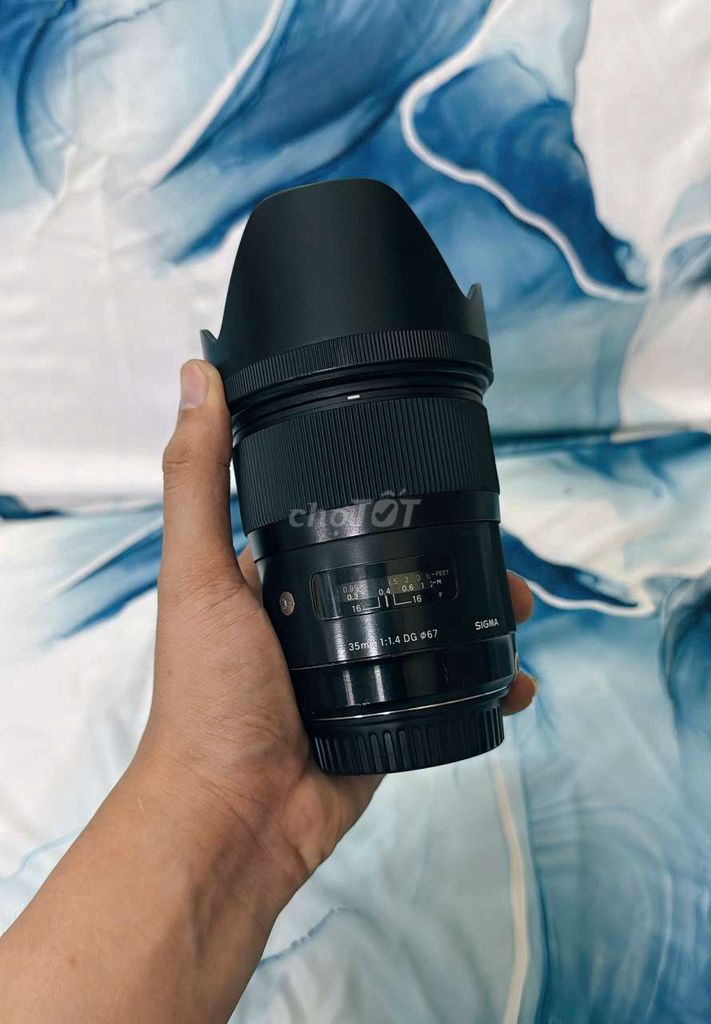 Ống kính Sigma 35mm f/1.4 DG Art Đen. Mua bán Máy ảnh, Máy quay tại Quận Tân Bình Tp Hồ Chí Minh được đăng bởi NguyenVu hình 1