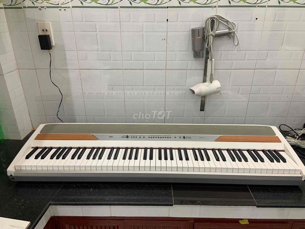 Piano Korg sp250