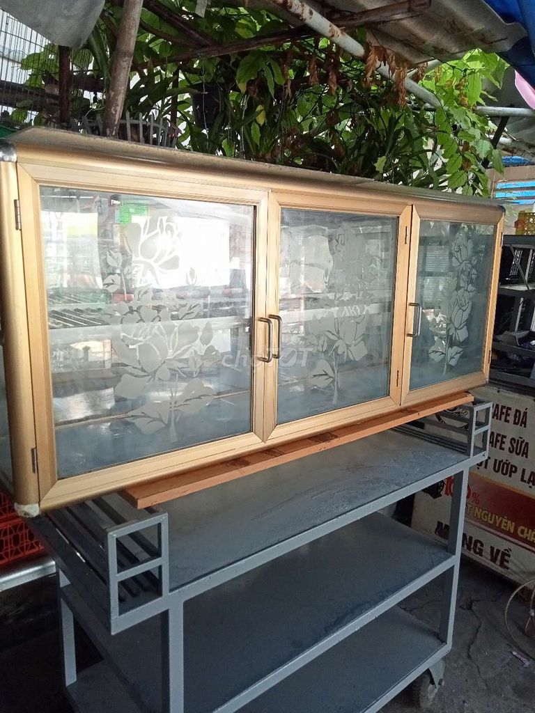 Tủ bếp treo tường nhôm kính vàng. Mua bán Tủ, kệ gia đình tại Quận Bình Tân Tp Hồ Chí Minh được đăng bởi Minh Hiền  hình 1