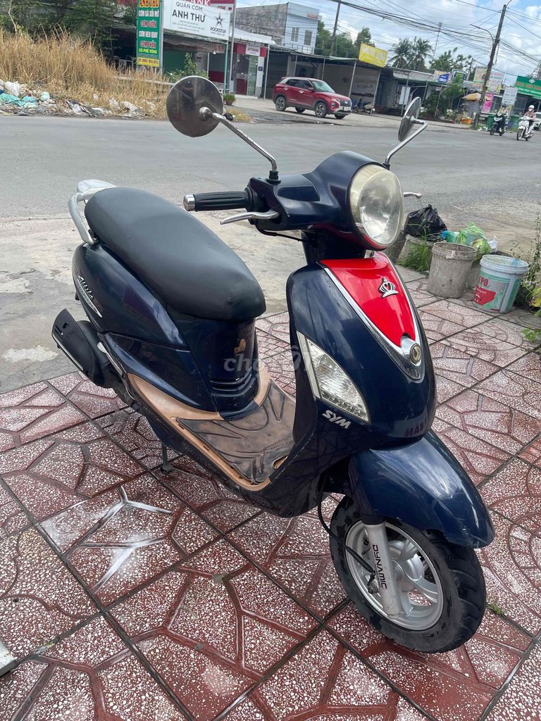 SYM Attila Fi 2013 Xanh Đỏ. Mua bán Xe máy tại Quận Cái Răng Cần Thơ được đăng bởi CẦM ĐỒ TRUNG TÍN  hình 2