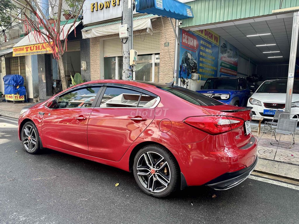 Kia K3 2015 Full option Đỏ. Mua bán Ô tô tại Thành phố Biên Hòa Đồng Nai được đăng bởi Luxury AUTO  hình 1