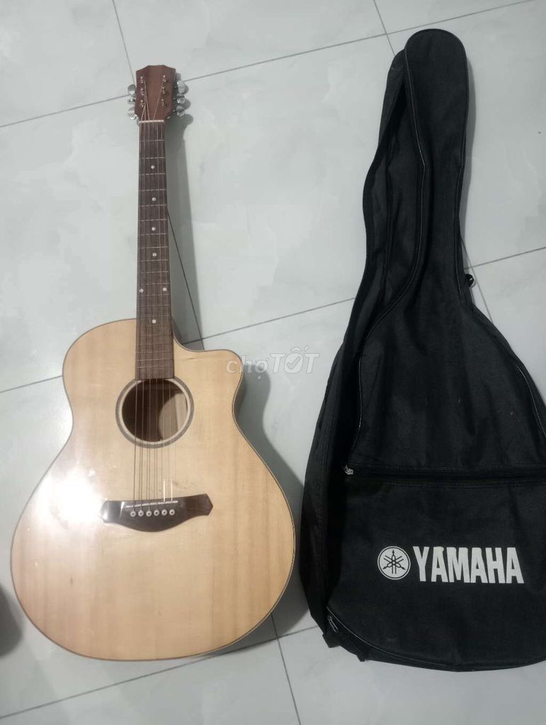 Đàn guitar acoustic Yamaha gỗ Nâu nhạt. Mua bán Nhạc cụ tại Thị xã Bến Cát Bình Dương được đăng bởi Hiếu Trần hình 1