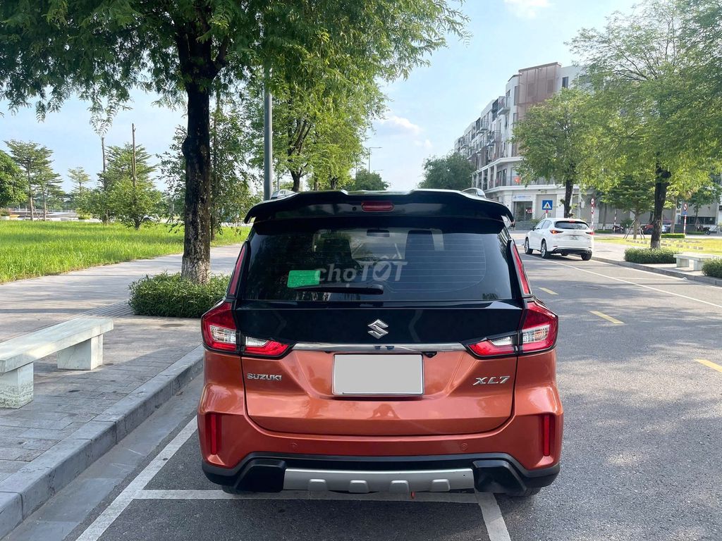 Suzuki XL7 sx 2021 màu cam. Mua bán Ô tô tại Quận Thanh Xuân Hà Nội được đăng bởi Thanh Biz Nguyễn Thái Auto hình 2