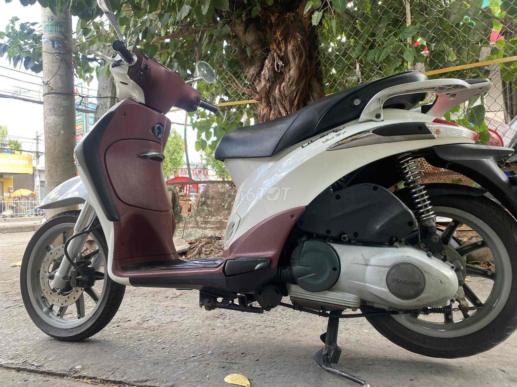 Piaggio Liberty Fi 125 3Vie 2014 trắng Zin100%. Mua bán Xe máy tại Quận Bình Tân Tp Hồ Chí Minh được đăng bởi Anh khuê hình 3