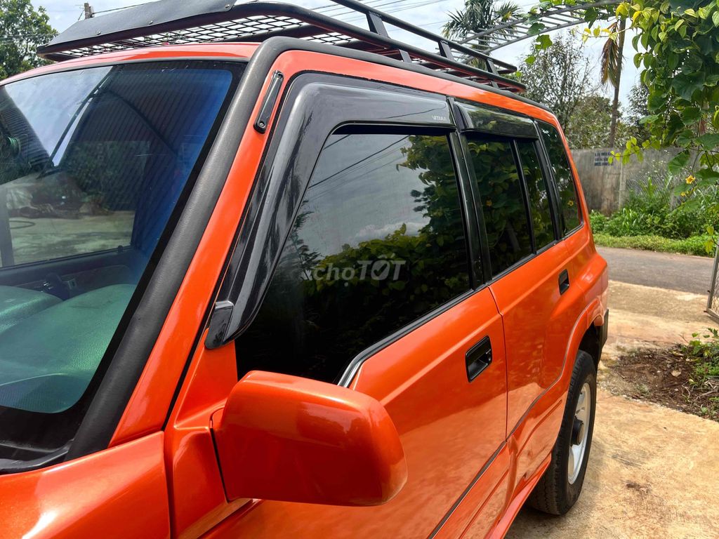 Suzuki Vitara JLX màu Cam. Mua bán Ô tô tại Huyện Krông A Na Đắk Lắk được đăng bởi Phạm Tiến Dũng hình 3