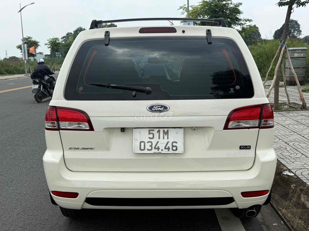 Ford Escape 2011 2.3L XLS 4x2 Trắng. Mua bán Ô tô tại Thành phố Thủ Dầu Một Bình Dương được đăng bởi  Trung Tin Used Car hình 2