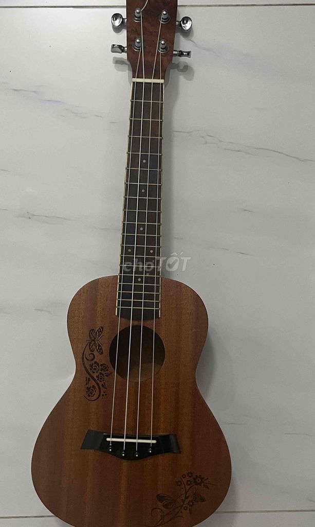 Đàn Ukulele gỗ màu Nâu. Mua bán Nhạc cụ tại Quận 11 Tp Hồ Chí Minh được đăng bởi Linh hình 1