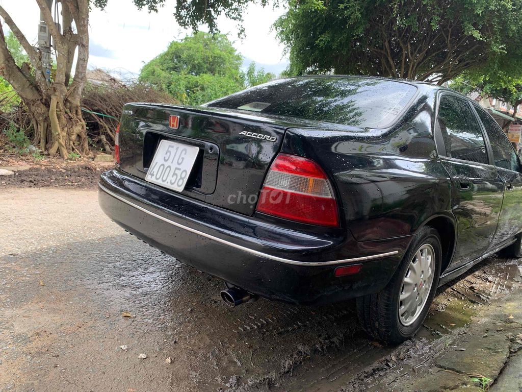 Honda Accord 1994 2.0 MT - 10000 km. Mua bán Ô tô tại Huyện Tam Bình Vĩnh Long được đăng bởi Vi tính Phát Lộc hình 6