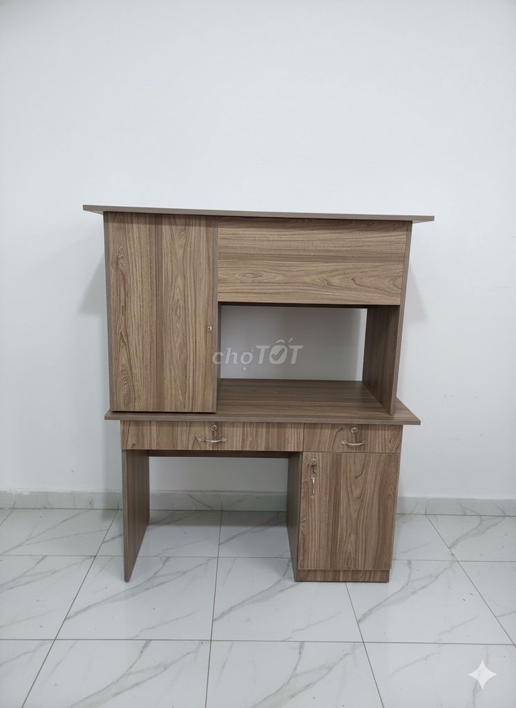 Bàn làm việc gỗ nâu vân gỗ. 60 x 120. Mua bán Bàn ghế tại Quận 10 Tp Hồ Chí Minh được đăng bởi BÀN TỦ KỆ TẠI XƯỞNG hình 1