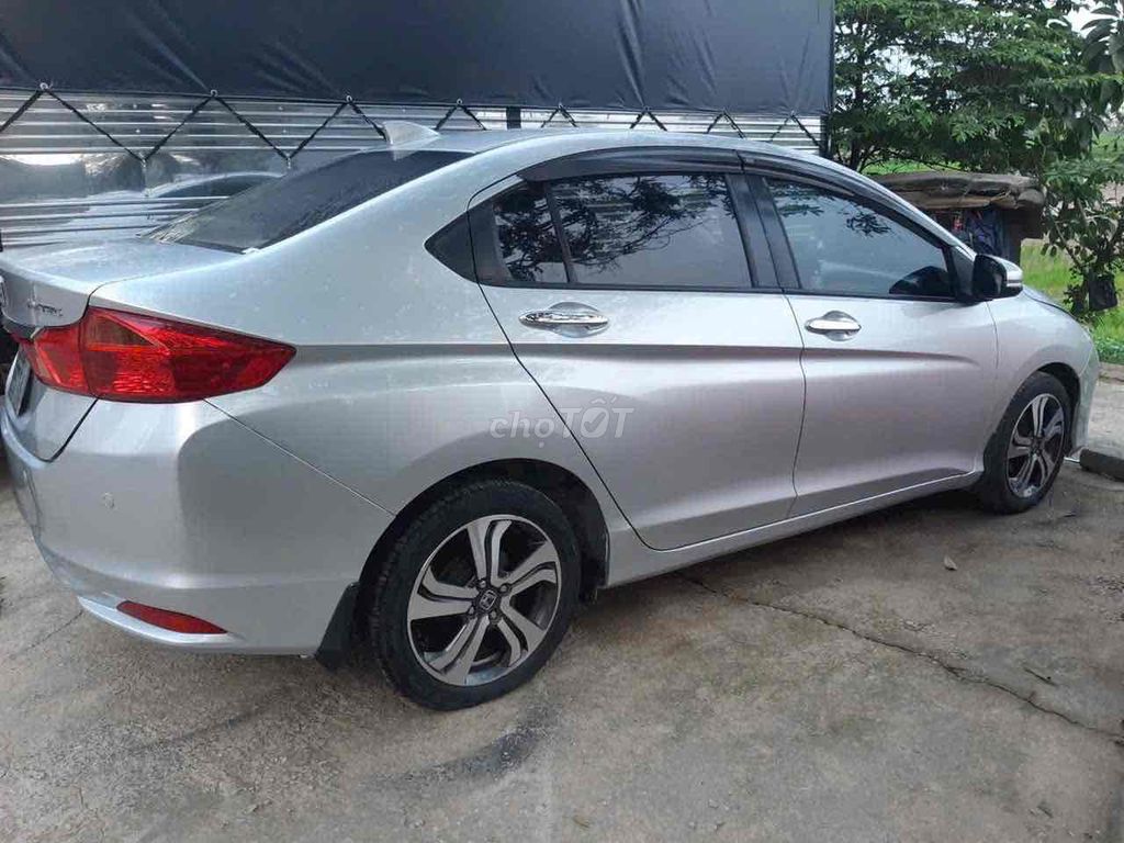 Honda City 2014 автомат серебристый